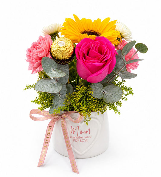 taza + flores variadas